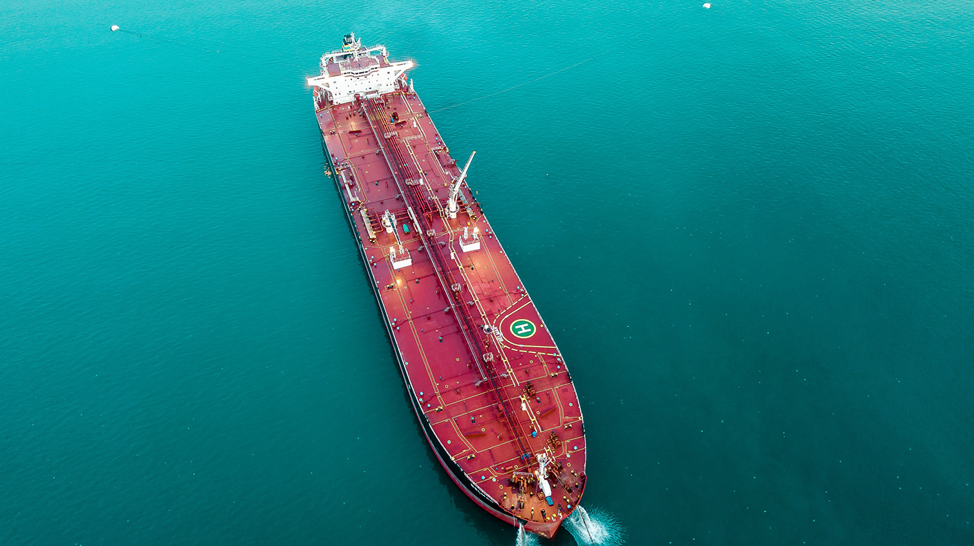 blue-cargo-ship-ocean-1036866 Home 1